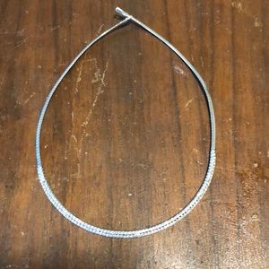 Silver necklace with false diamonds